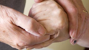 Couple married 64 years dies within hours of each other, holding hands