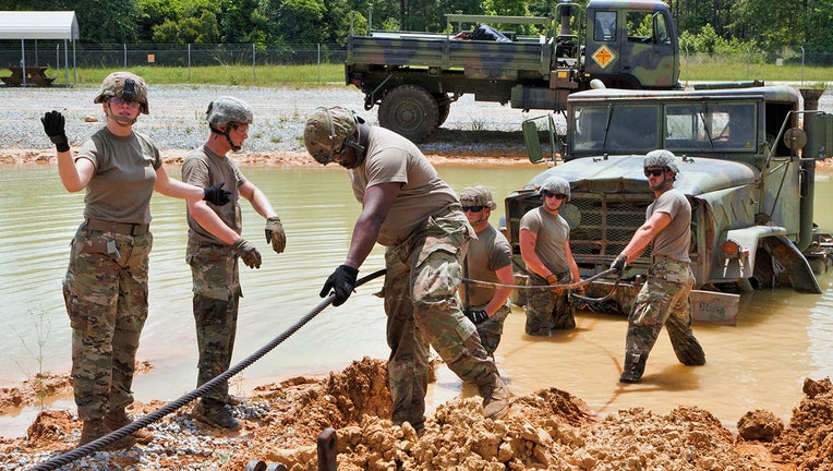 Soldiers from the 631st Support Maintenance Co. in Starke, Florida practice recovery operations training at Camp Shelby, Mississippi.