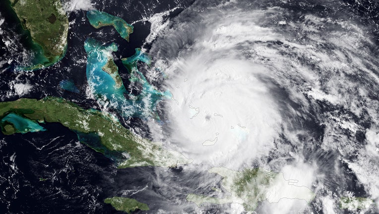 FILE: In this handout GOES satellite image provided by the National Oceanic and Atmospheric Administration (NOAA), colorized infrared and visible images show Hurricane Irene's eye forming on August 24, 2011 in the Caribbean Sea. (Photo by NOAA via Getty Images)
