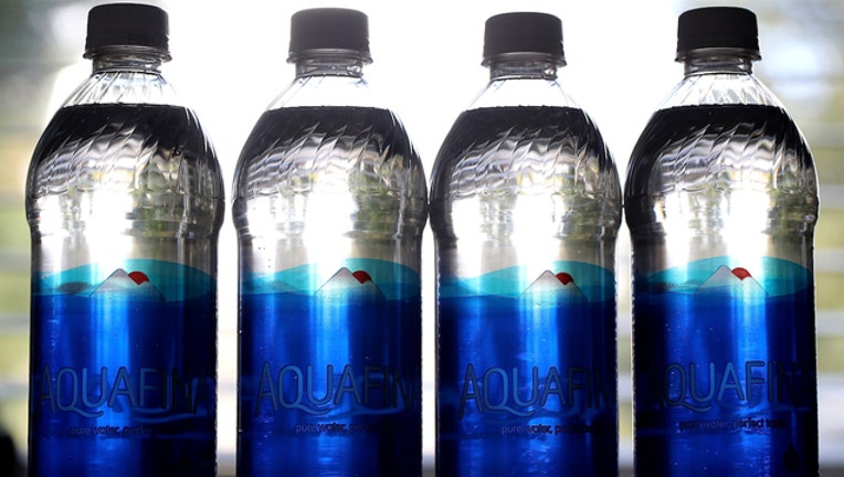 A new study by State University of New York at Fredonia found that 93% of water tested in 259 water bottles from 11 brands contained microplastic contamination at two times higher than found in tap water. (Justin Sullivan/Getty Images)