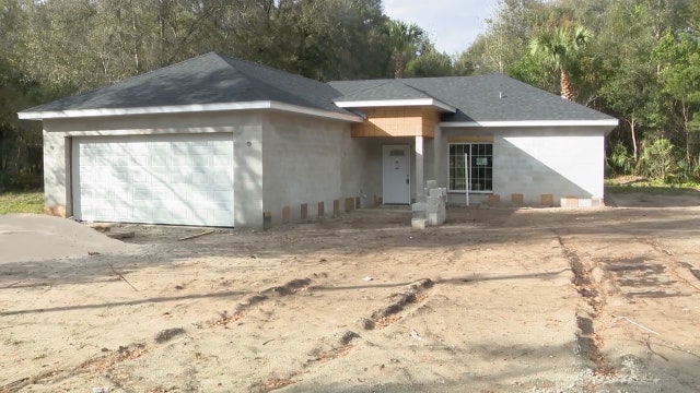 Home partly built on public land to be moved