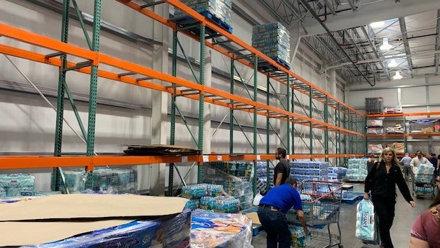 Panicked shoppers flock to Walmart, Costco to stock up as coronavirus fears increase