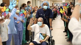 Central Florida hospital workers cheer as 63-year-old coronavirus patient is released