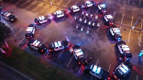 Florida police park cruisers in shape of heart outside hospital to thank doctors, nurses fighting coronavirus