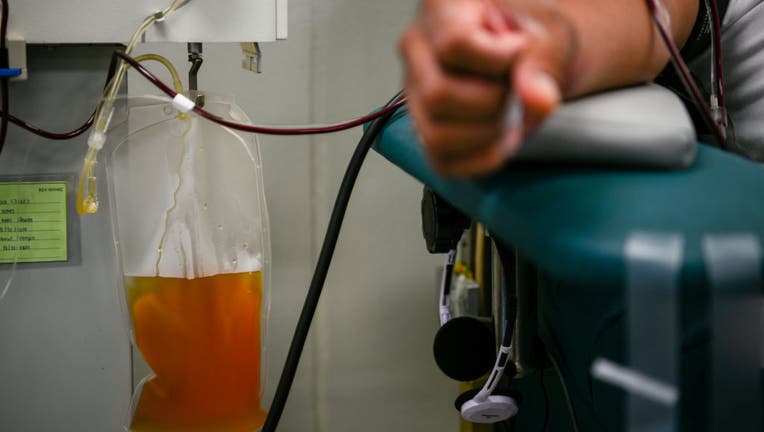 a68f9a6b-View of a blood plasma bag from a donor during the blood