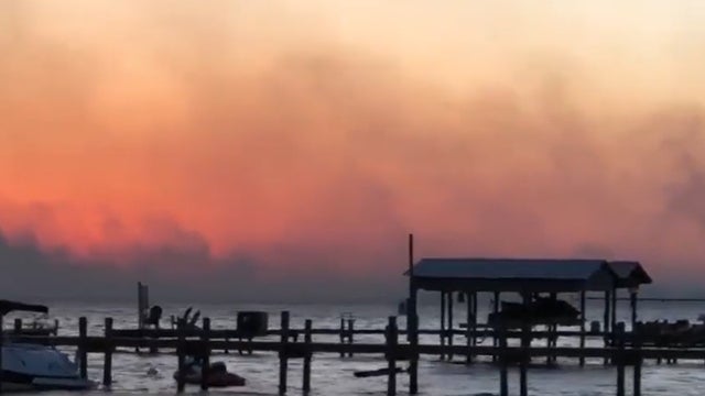 Hundreds evacuated as wildfires destroy homes in Florida Panhandle