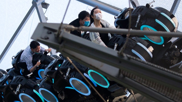 PHOTOS: Shanghai Disneyland reopens with social distancing in lines, limited capacity, new safety protocols