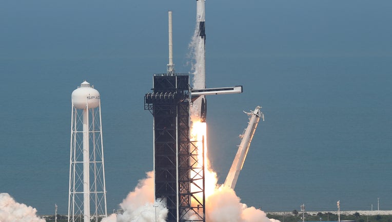 2f7dc48b-SpaceX Falcon-9 Rocket And Crew Dragon Capsule Launches From Cape Canaveral Sending Astronauts To The International Space Station