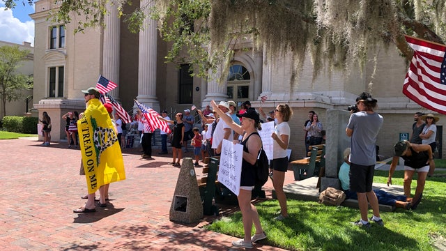 Protesters gather in DeLand calling for end of face mask ordinance