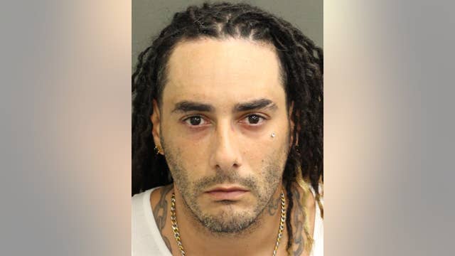 Orlando man accused of hitting Disney security guard over face mask