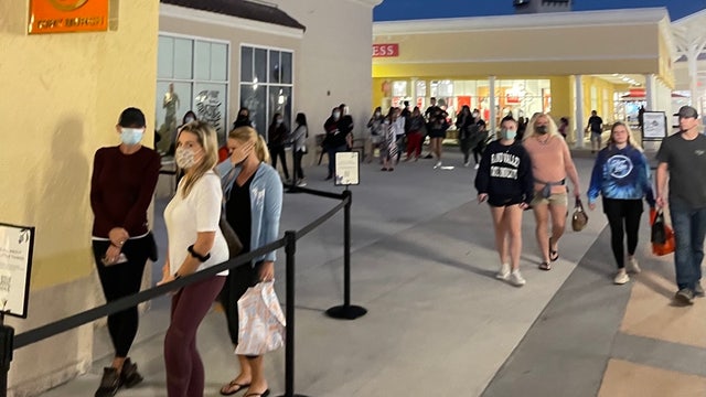 Shoppers line up for Black Friday deals despite COVID-19 changes