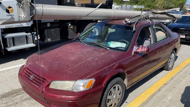 Florida man hauled stolen I-4 utility pole atop his sedan, troopers say
