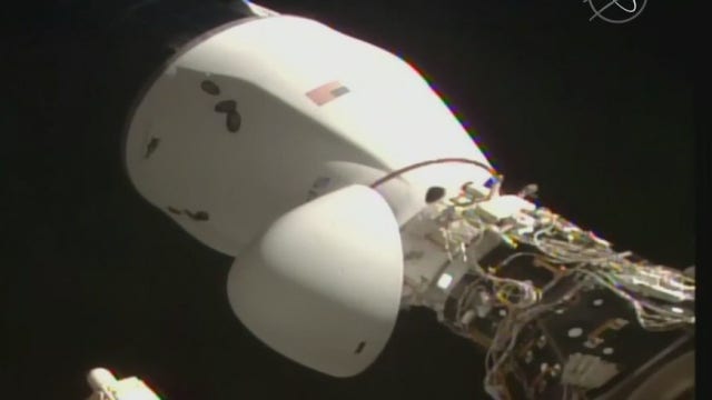 SpaceX Dragon 2 cargo ship docks on International Space Station
