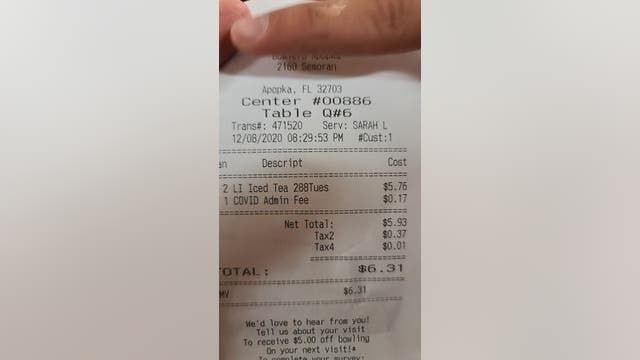 Receipt at local business shows 'COVID Admin Fee'