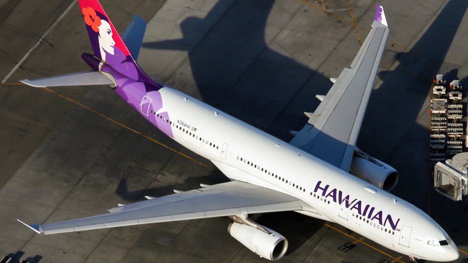 12110104-An Hawaiian Airlines Airbus 330-200 parked at Los Angeles