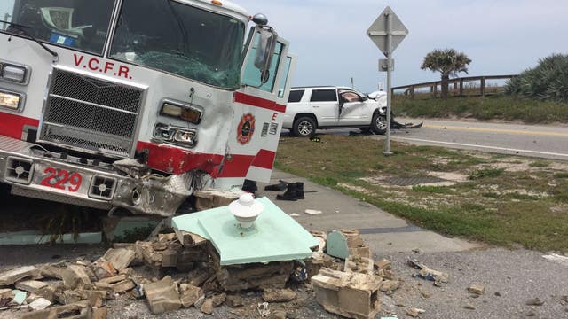 Firefighters hit head-on, jump out to rescue other driver