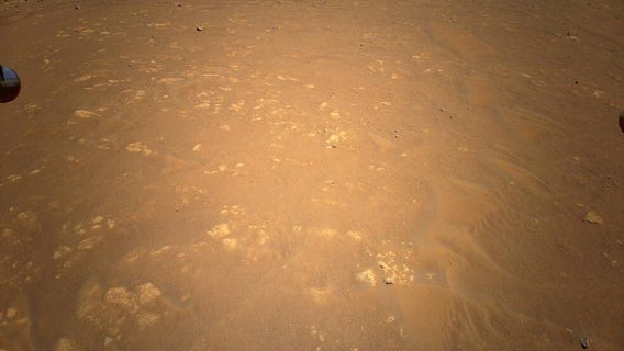 Ingenuity Mars helicopter captures Perseverance rover in unprecedented aerial shot