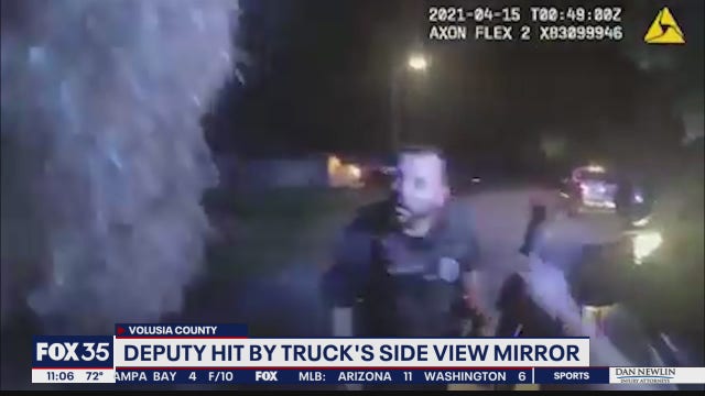 WATCH: Volusia deputy clipped by truck during traffic stop