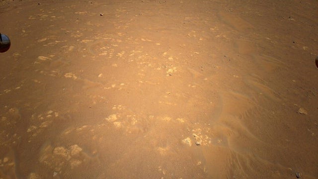 Ingenuity Mars helicopter captures Perseverance rover in unprecedented aerial shot