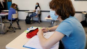 CDC recommends all schools continue to use masks