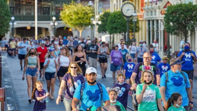 PHOTOS: Guests walk through Disney, Universal without masks for 1st time in over a year