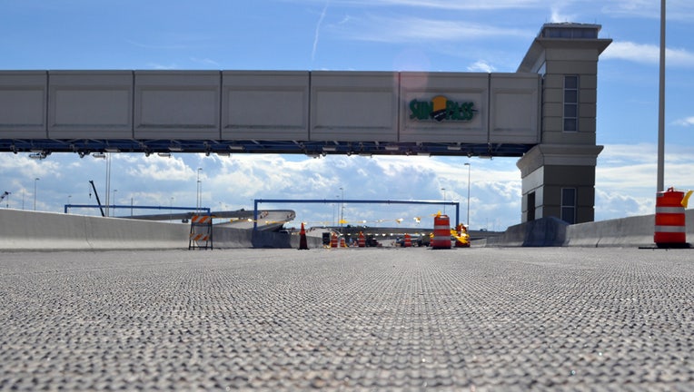 f7c8f053-sunpass20toll20plaza20under20construction_1566914940398.jpg_7619183_ver1.0.jpg