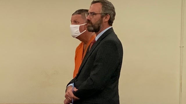 Foster father accused of molesting children back behind bars