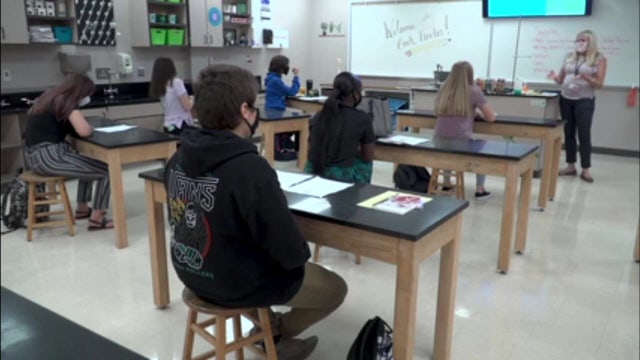 Lawsuit challenges DeSantis' mask order as Florida OKs school vouchers in districts requiring COVID-19 masks