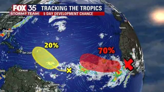 Hurricane center monitoring 2 tropical waves in the Atlantic