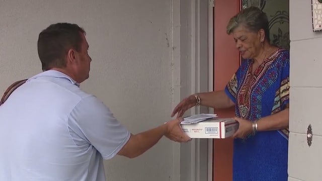 Mail carrier credited for busting up alleged fraud scheme