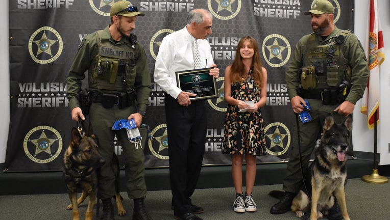 Peyton Receives an Award from Volusia County Sheriff Mike Chitwood