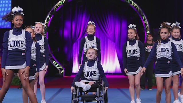 Florida girl completes 1st cheerleading season while using wheelchair