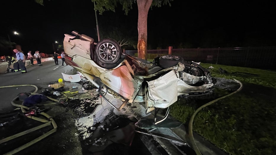 WOFL Woman rescued from burning car