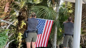American flag found in Florida river after Hurricane Ian now flies high above water
