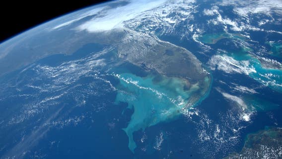 Shocking photos from space show Florida 'shedding' water from Hurricane Ian