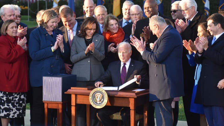 President of the United States Joe Biden signs the Bipartisan Infrastructure Deal