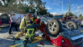 Ocala firefighters rescue driver in 2-vehicle rollover crash