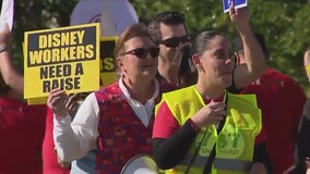 Disney workers rally for a raise in march outside Florida parks